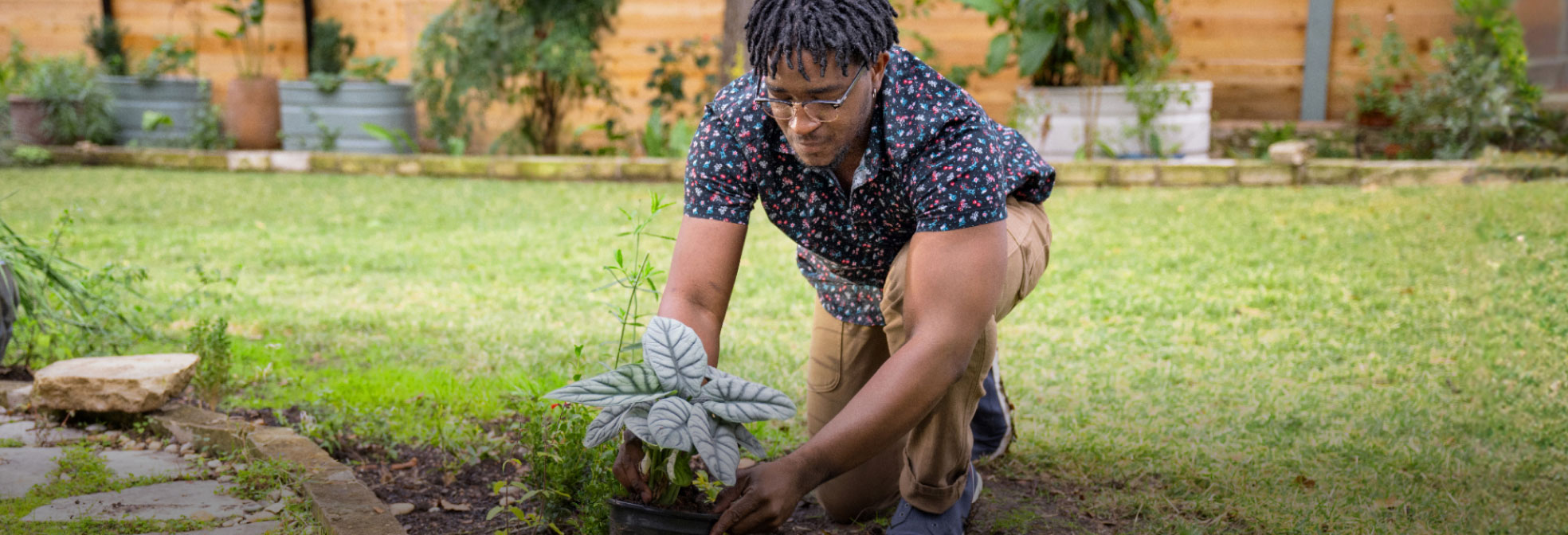 Man planting in a garden